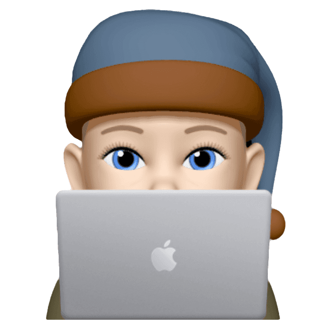 My memoji sitting in front of open laptop
